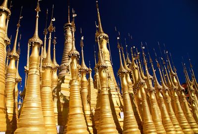 Low angle view of temple against building