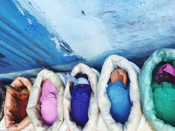 High angle view of multi colored pencils in water