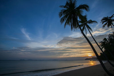 Scenic view of sea against sky at sunset