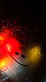 Full frame shot of raindrops on glass