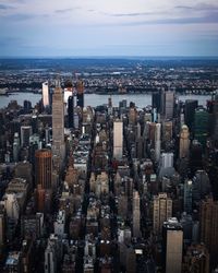 High angle view of buildings against sky in city