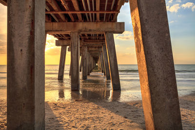 Scenic view of pier over sea against sky