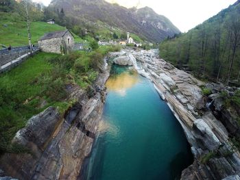 High angle view of river amidst landscape against sky