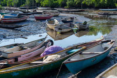 Boats moored at harbor