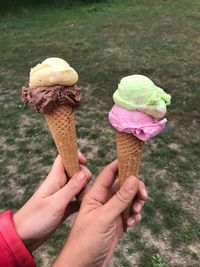 Hand holding ice cream cone