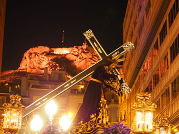 Low angle view of illuminated building at night