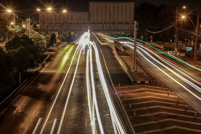 High angle view of light trails on road at night