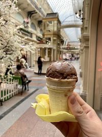 Person holding ice cream