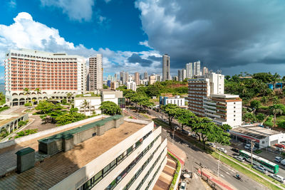 High angle view of buildings in city against sky