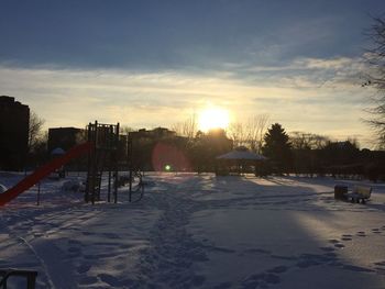 Scenic view of sunset in city during winter