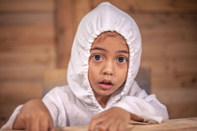 Portrait of cute baby boy at home