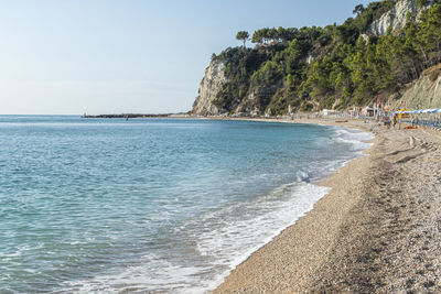 The beautiful beach of san michele in sirolo with blue water