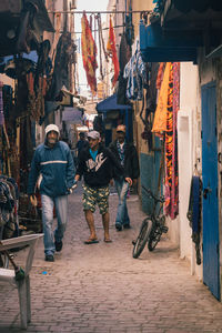 People walking on street market