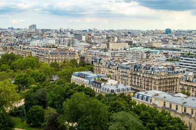 Aerial city landscape of paris, lots of roofs characteristic roofs and chimney