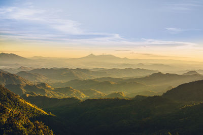 Scenic view of mountains against sky during sunset