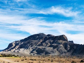 Rock formation on mountain against sky