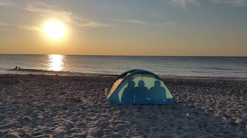 Scenic view of sea at sunset