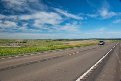 Road passing through rural landscape