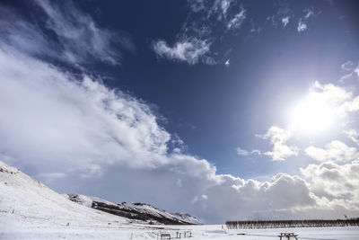 Scenic view of sea against sky during winter