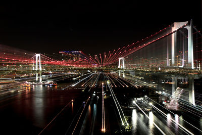 Burst zoom tight trails on tokyo rainbow bridge at night