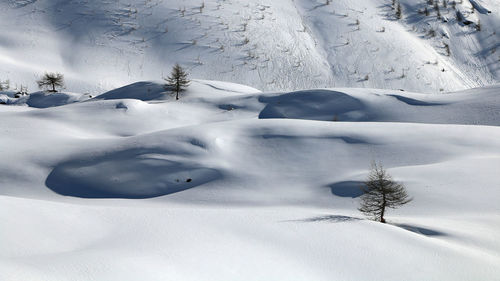 Italian alps, valle d'aosta, italy. beautiful alpine snowy landscape in a sunny winter day.