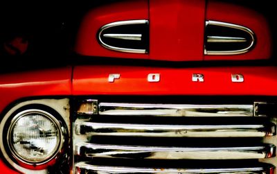 Close-up of red vintage car