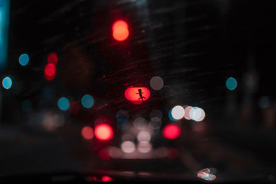 Defocused image of illuminated lights at night