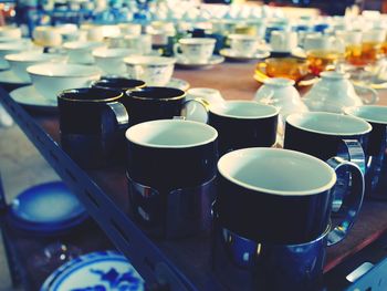 High angle view of coffee cups on table