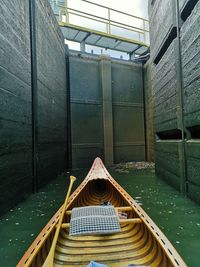 Empty rowboat on river