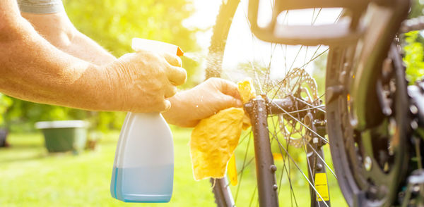 Cropped image of man holding water