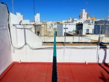 Close-up of rope against blue sky