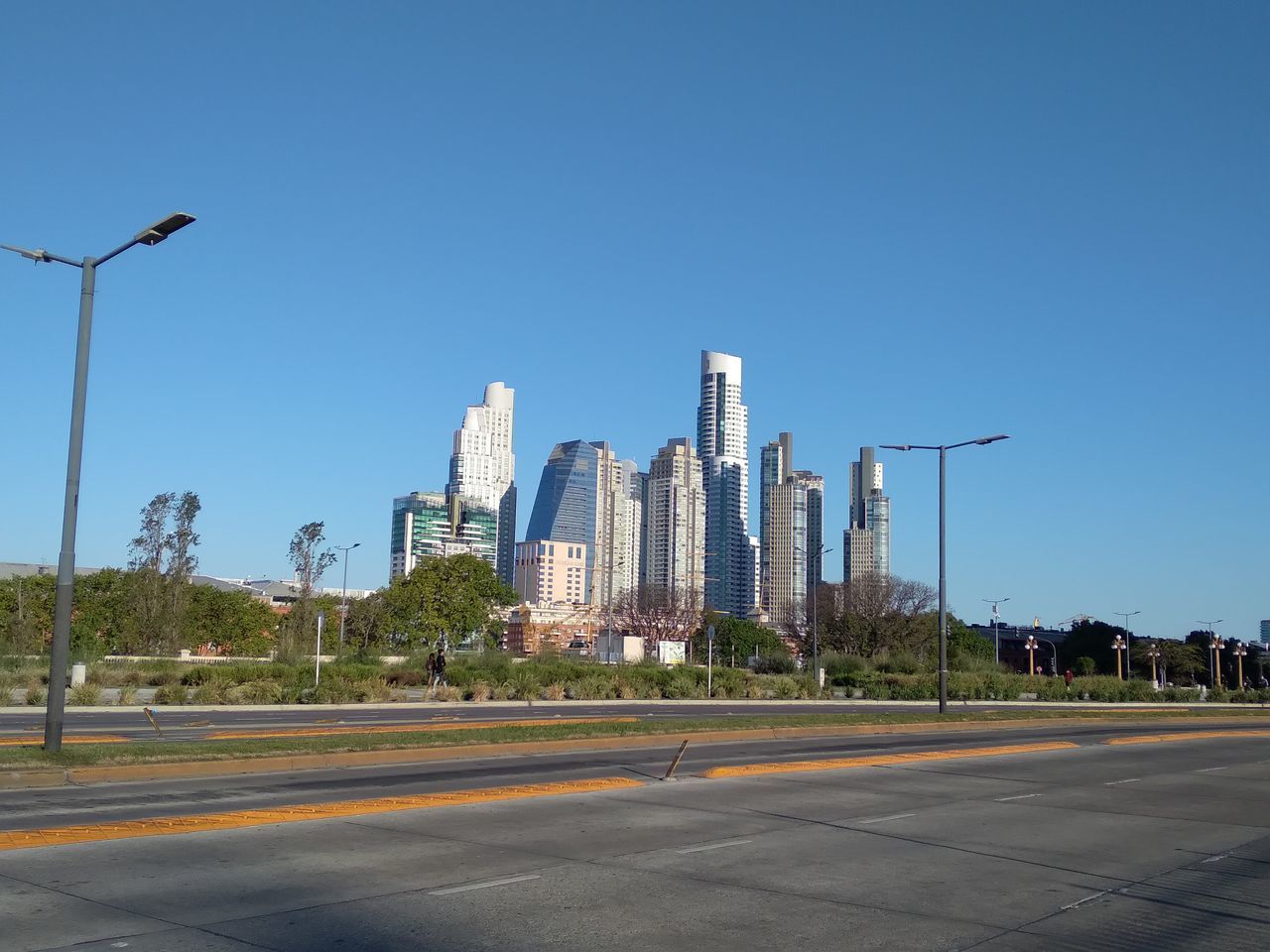 VIEW OF CITY STREET AGAINST SKY