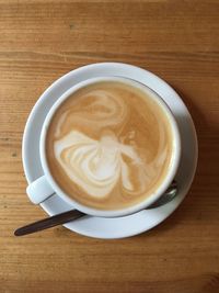 Directly above shot of cappuccino on table