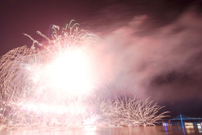 Firework display at night