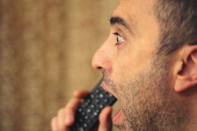 Close-up portrait of man looking away outdoors