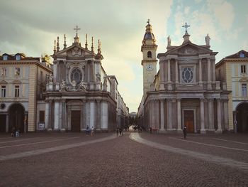 Historic churches at piazza san carlo against sky