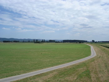 Scenic view of soccer field against sky