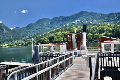 Pier over lake against sky