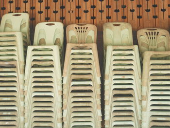 Chairs stacked against wall