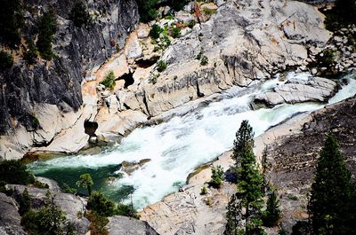 Scenic view of river seen through cave