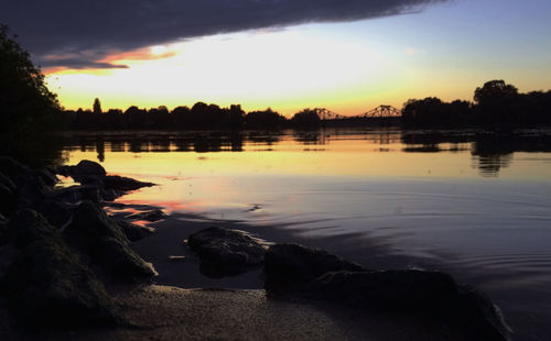 Scenic view of sea at sunset