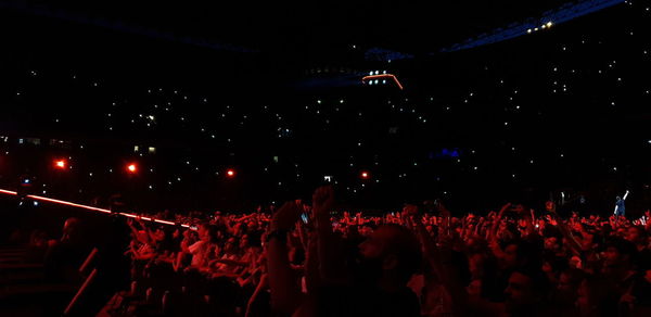 Crowd at music concert at night