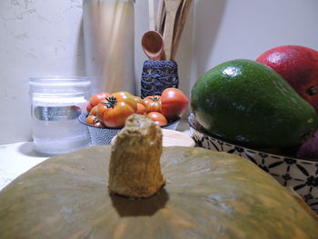 Close-up of apples on table at home