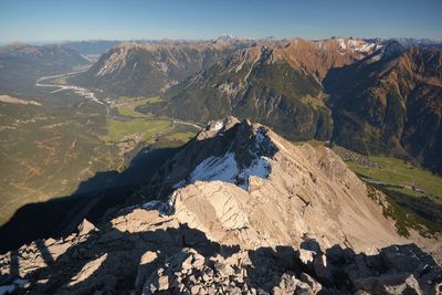 High angle view of rock on land against sky