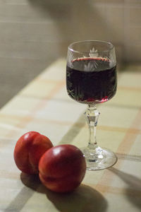 Close-up of wineglass on table