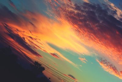 Scenic view of cloudy sky at sunset