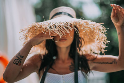 Portrait of woman wearing hat