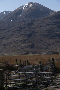 Scenic view of landscape and mountains against sky