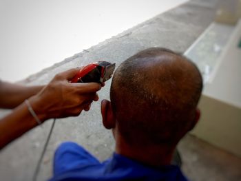 Close-up of hand holding ice cream