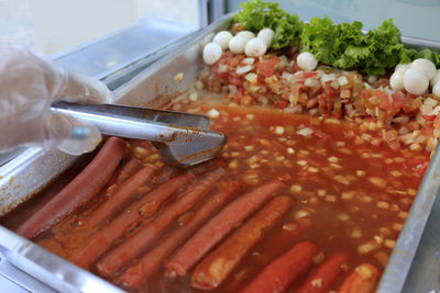 Close-up of hand holding food